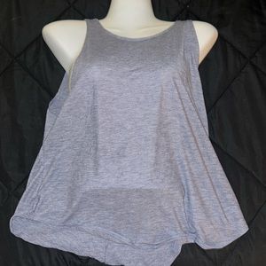 Under armor .. glare tank with back cut out